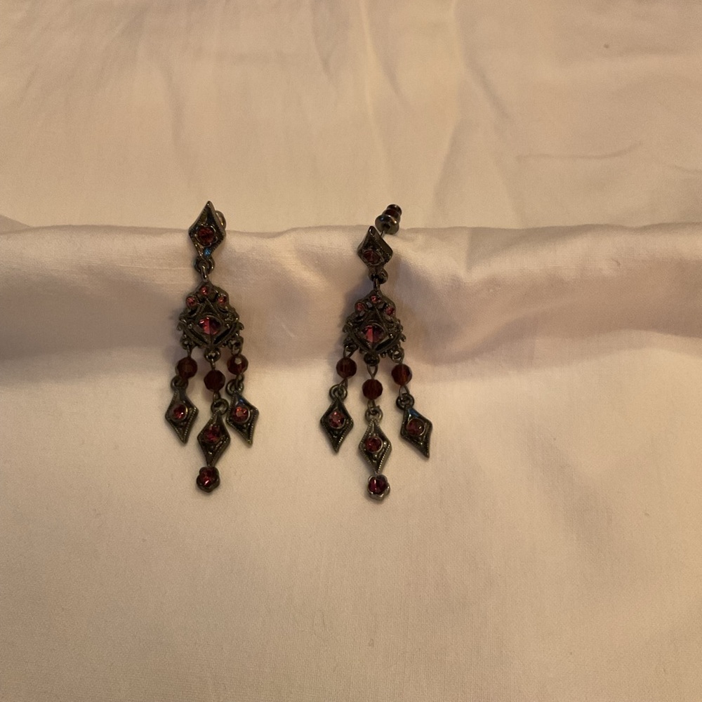 Hanging Pierced Earrings with Burgundy Colored Stones.